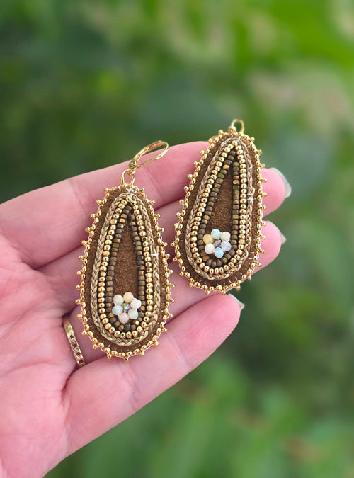 Opal Florals on tradish tanned hide